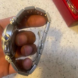 Cartier pasha men.  Not for a fat wrist ! Think only have one link.